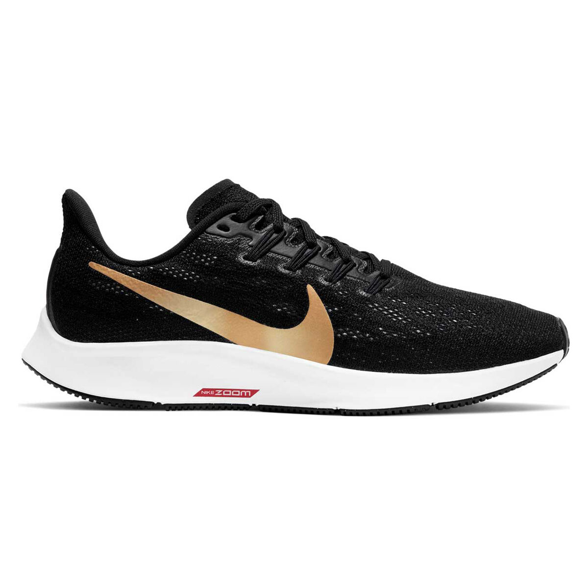 nike running pegagus 36 sneakers in black with gold swoosh