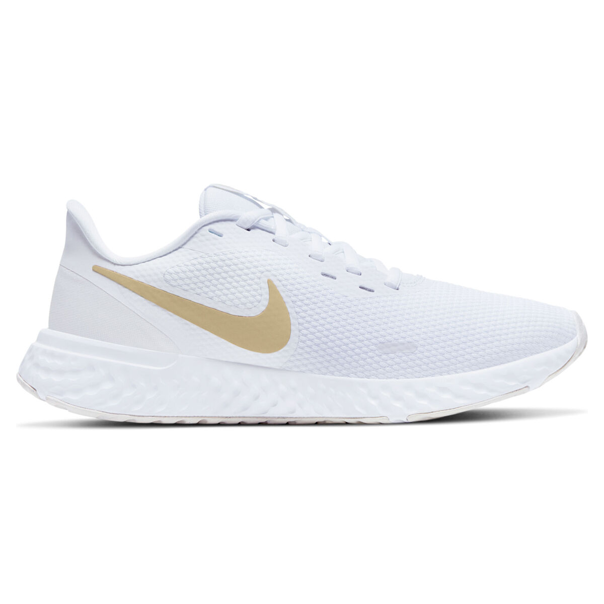 white and gold nike shoes