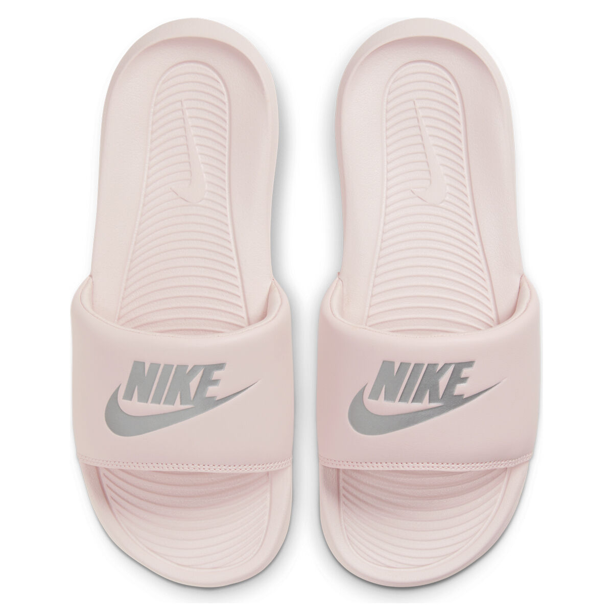 pink and silver nike slides